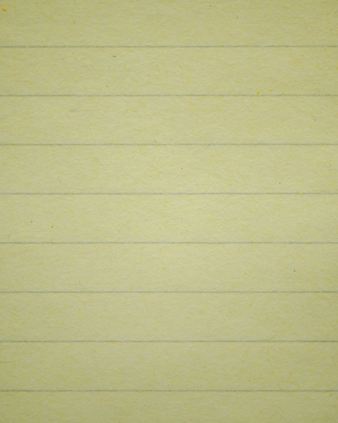 Close-up shot of a lined paper texture, ideal for writing or note-taking backgrounds.