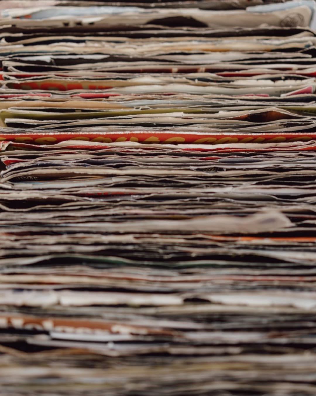 Close-up view of a stack of paper, ideal for recycling and texture concepts.