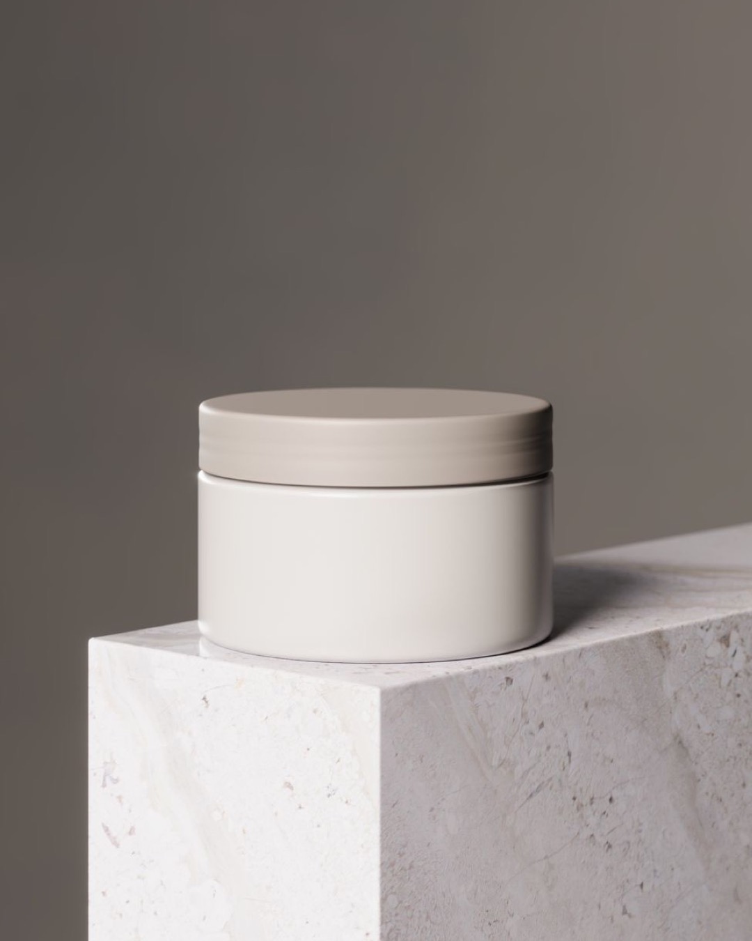 Elegant white jar with gray lid on marble, perfect for beauty and lifestyle products.